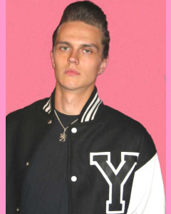 Usually there's letter Y (Yale) on the chest. It can be removed easily.  Or you can order a jacket with an other letter